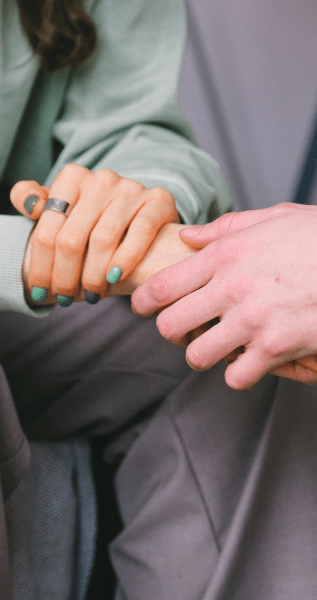 holding hands for support - workplace wellness
